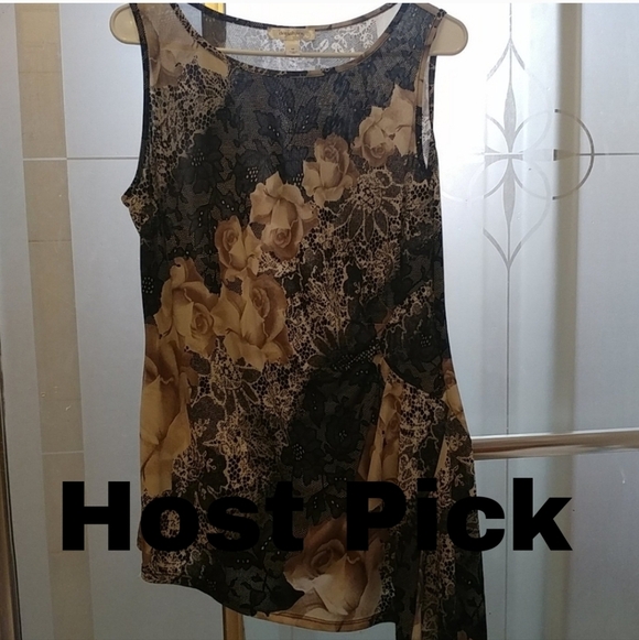dressbarn Tops - Women Floral top with unique design; a asymmetrical hem on The One Side